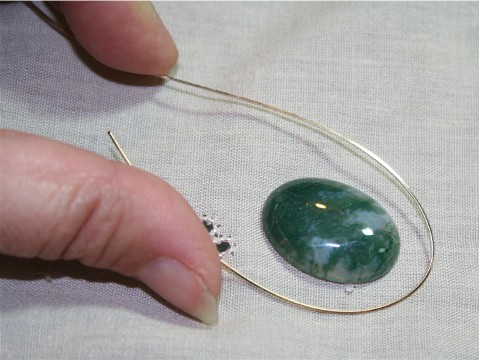 Wire wrapping round on sale stones